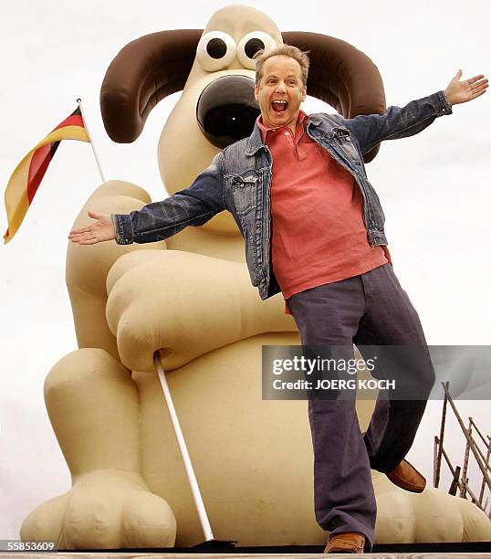 Animation film director Nick Park poses on 05 October 2005 in Munich beside a giant Gromit figure to promote his new film. The movie "Wallace &...