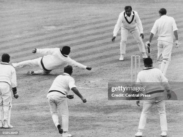 England captian Ray Illingworth is caught out for a duck by Mushtaq Mohammad of the Rest Of The World team in England's second innings in the fifth...