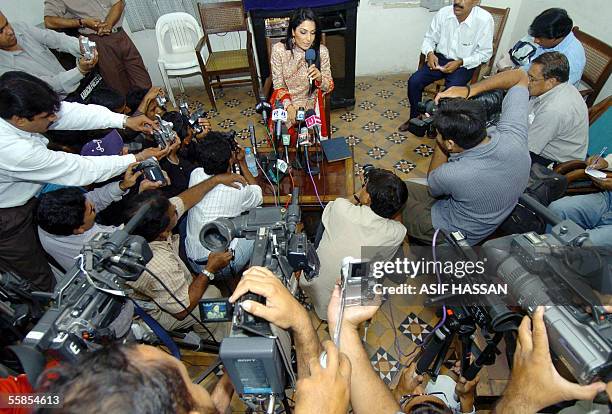 Popular Pakistani actress Meera is surrounded by media representatives during a press conference in Karachi, 05 October 2005. Meera, whose life was...