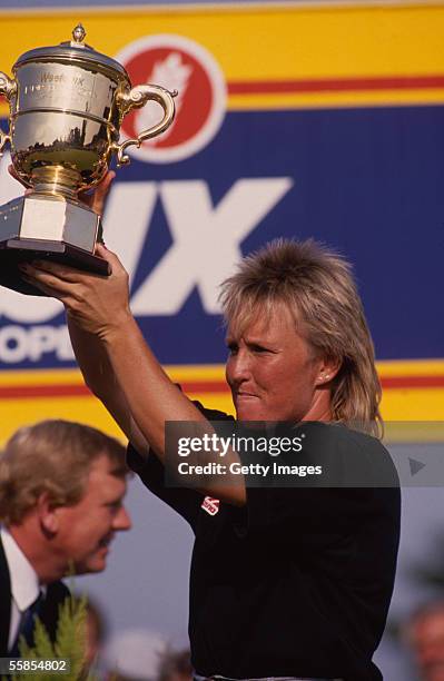 Jane Geddes poses with the trophy after winning the Weetabix Ladies British Open held in July 1989 at Woburn Golf & Country Club in Milton Keynes,...