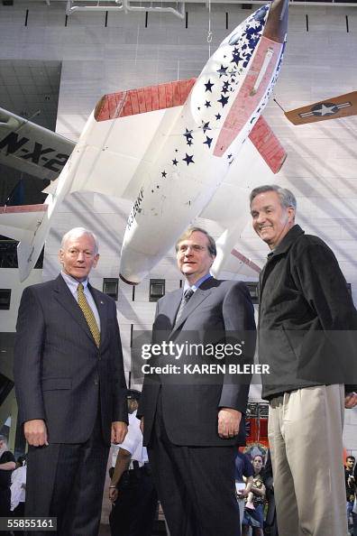 SpaceShipOne designer Burt Rutan stands with project donor Paul Allen ...