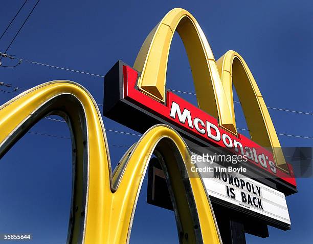 Sign for the new Monopoly game is seen outside a McDonald's restaurant October 5, 2005 in Niles, Illinois. McDonald's, partnered with Best Buy, has...