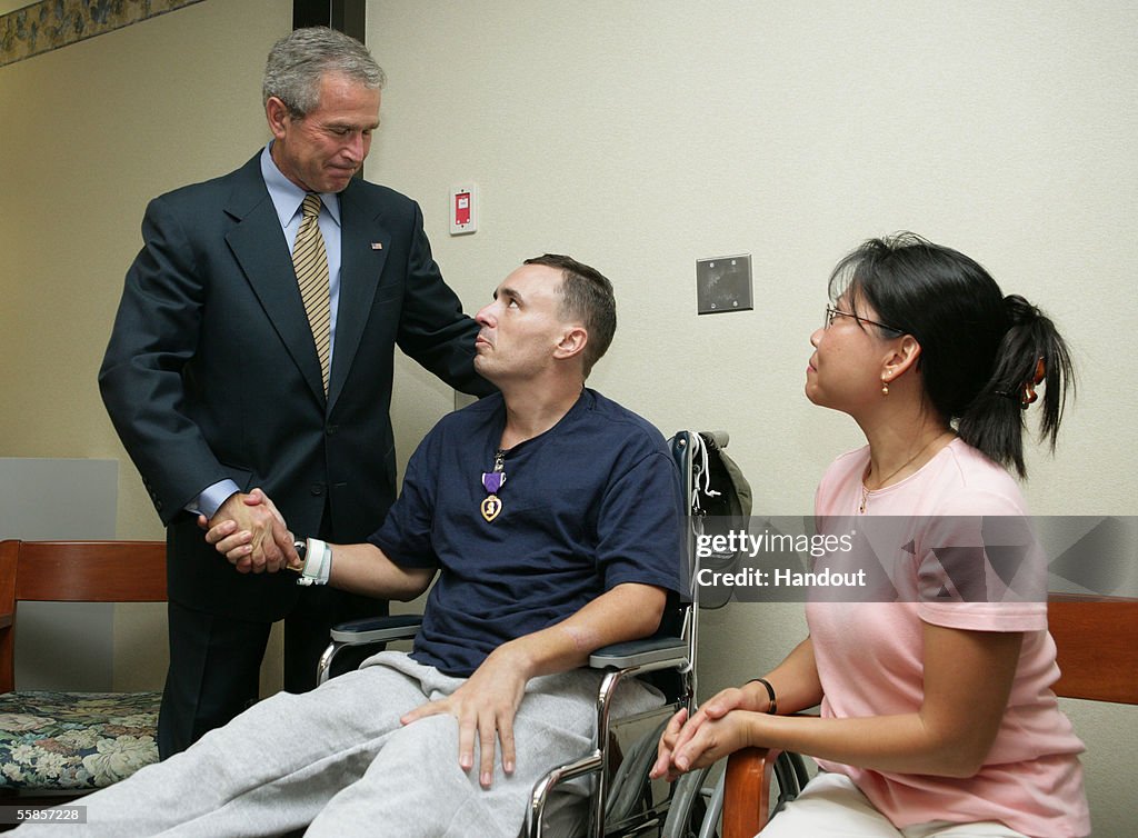 President Bush And First Lady Visit Injured Soldiers