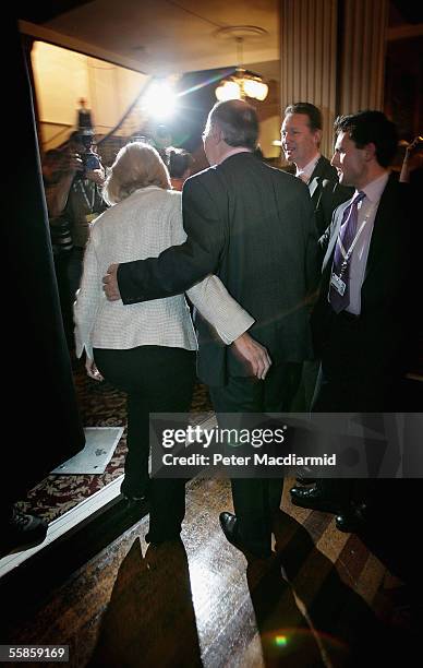 Michael Howard and his wife Sandra are seen leaving the stage after making his last speech as leader on October 6, 2005 in Blackpool, England. The...