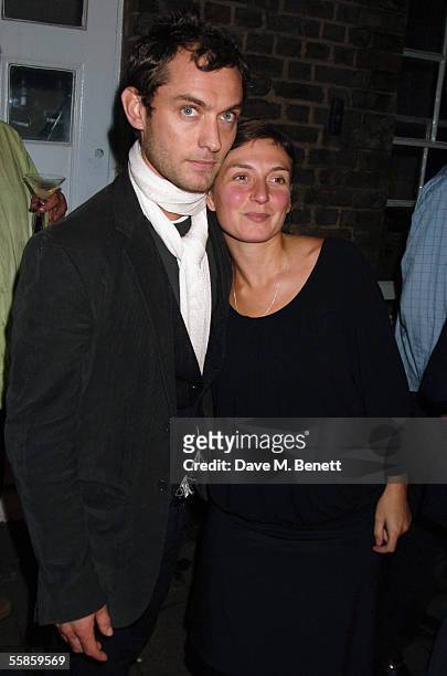 Jude Law and his sister Natasha Law attend the private view for an opening exhibition at new gallery 'Eleven' managed by Laura Parker Bowles which...