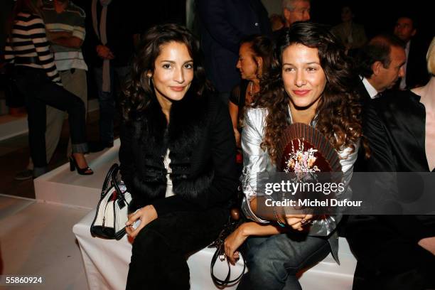 Astrid Munoz and Maria Jurado watches the Loewe show as part of Paris Fashion Week Spring/Summer 2006 on October 6, 2005 in Paris, France.