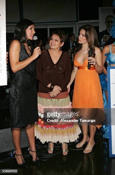 Candela Ferro, Maria Antonietta Collins and Ileana Garcia pose at Bongos Cuban Cafe for the House King magazine premier party on October 5, 2005 in...