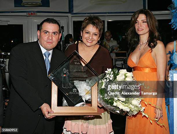 Omar Pardillo, Maria Antonietta Collins, Ileana Garcia pose at Bongos Cuban Cafe for the House King magazine premier party on October 5, 2005 in...