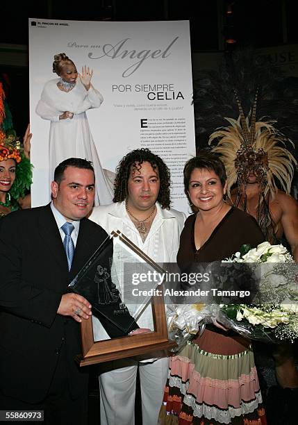 Omar Pardillo, D'Angelo Salvatore, Maria Antonietta Collins pose at Bongos Cuban Cafe for the House King magazine premier party on October 5, 2005 in...