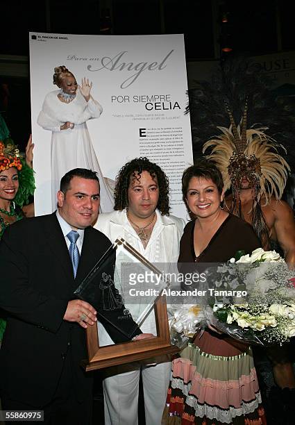 Omar Pardillo, D'Angelo Salvatore, Maria Antonietta Collins pose at Bongos Cuban Cafe for the House King magazine premier party on October 5, 2005 in...