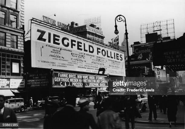 View of the marquee for the 1936 edition of the Ziegfeld Follies at the Winter Garden Theatre in Times Square, New York, New York, 1936. Comedians...
