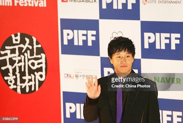 Korean star Cha Tae-hyun poses for pictures during the opening ceremony of Pusan International Film Festival on October 6, 2005 in Pusan, South...
