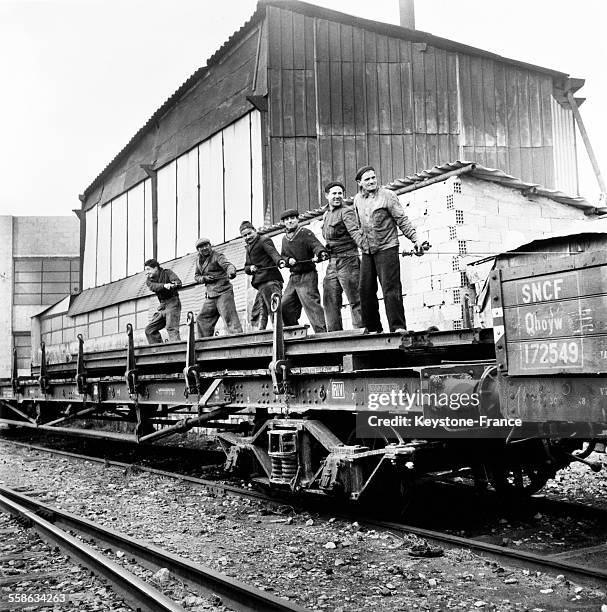 Workers In Train Station, in Marseille, France, In 1956.