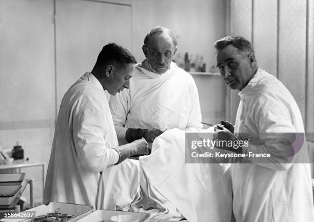 Doctor Samuel Serge Voronoff during surgery, in October 1929 in Paris, France.