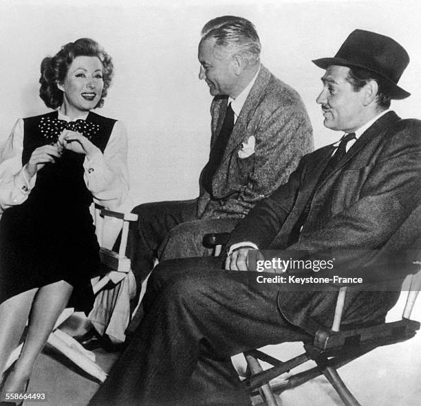 Les acteurs hollywoodiens Clark Gable, Art Fleming et Greer Garson.