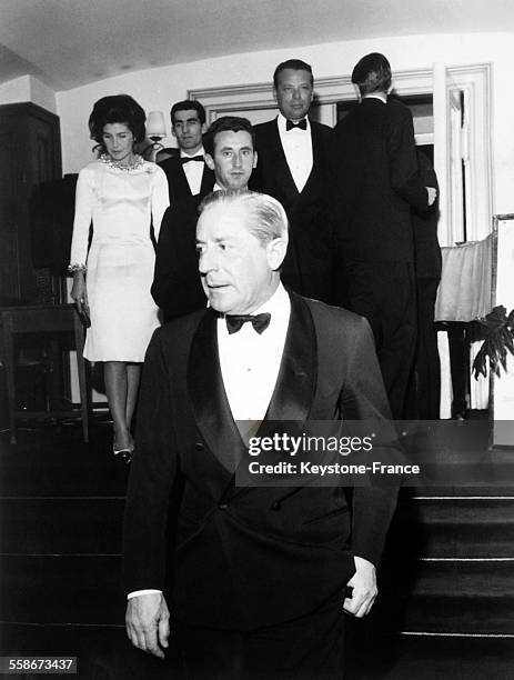 Armateur Stavros Niarchos arrive au Palace Hotel ou est organisee une grande soiree pour le nouvel an a Saint-Moritz, Suisse, le 4 janvier 1965.