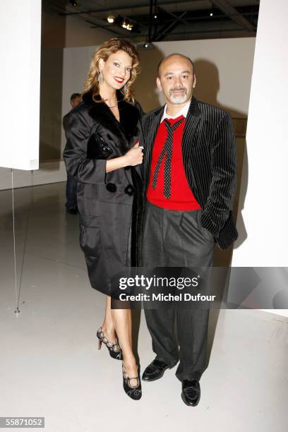 Linda Evangelista and Christian louboutin attend the Dada Beaubourg dinner as part of Paris Fashion Week Spring/Summer 2006 on October 6, 2005 in...