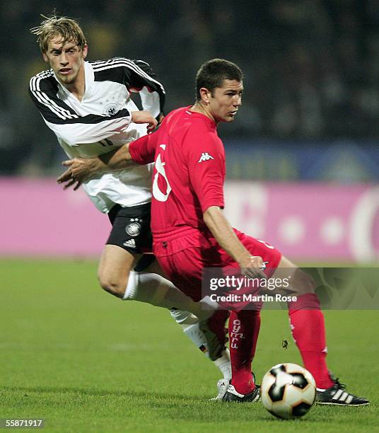 Aaron Hunt of Germany and Anthony Pulis of Wales fight for the ball during the Under 21 European Championship Qualifier match between Germany and...