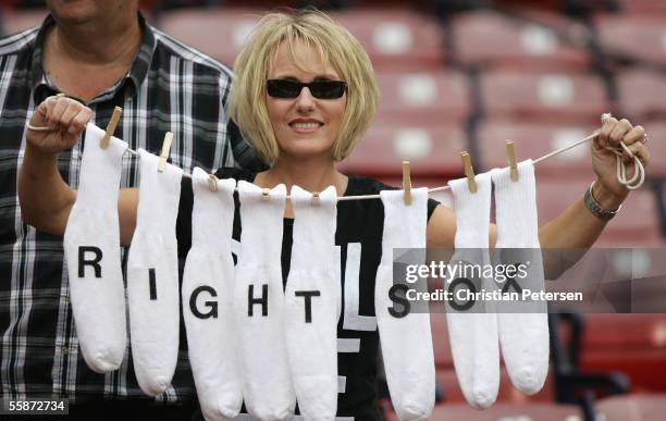 Chicago White Sox fan Donna Marketti from Gardner, Illinois shows her support before the start of Game Three of the American League Division Series...