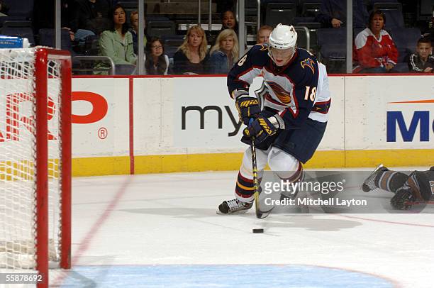 Marian Hossa of the Atlanta Thrashers skates in to score an empty net goal against the Washington Capitals late in the third period on October 7,...
