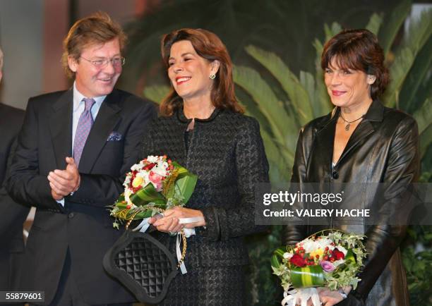 Princess Caroline of Monaco-Hanover , flanked by her sister Stephanie , and her husband Prince Ernst August of Hanover, attends the official...