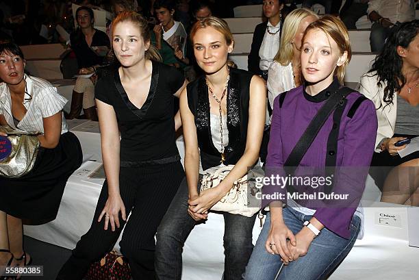 Natacha Regnier, Diane Kruger and Ludivine Sagnier attend the Chloe show as part of Paris Fashion Week Spring/Summer 2006 on October 8, 2005 in...