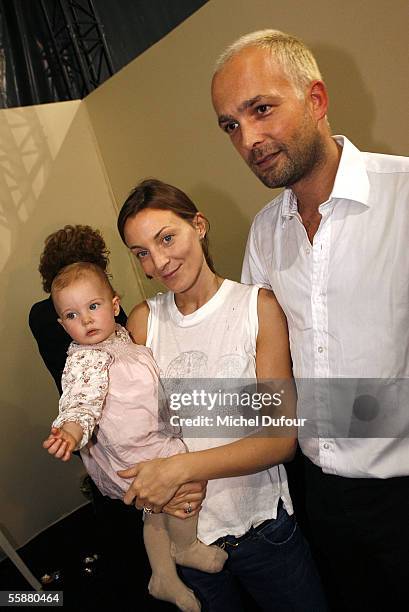 Phoebe Philo with her daugther Maya and her husband are seen backstage during the Chloe show as part of Paris Fashion Week Spring/Summer 2006 on...