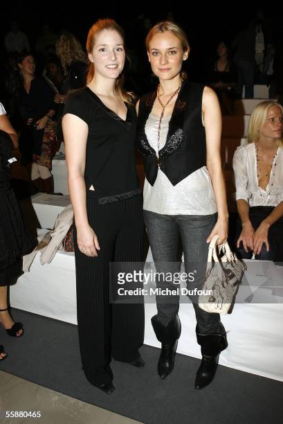 Natacha Regnier and Diane Kruger attend the Chloe show as part of Paris Fashion Week Spring/Summer 2006 on October 8, 2005 in Paris, France.