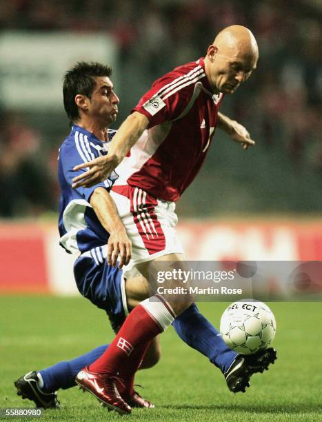 Konstantinos Katsouranis of Greece and Thomas Gravesen of Denmark fights for the ball during the FIFA World Cup 2006 Group 2 Qualifier match between...