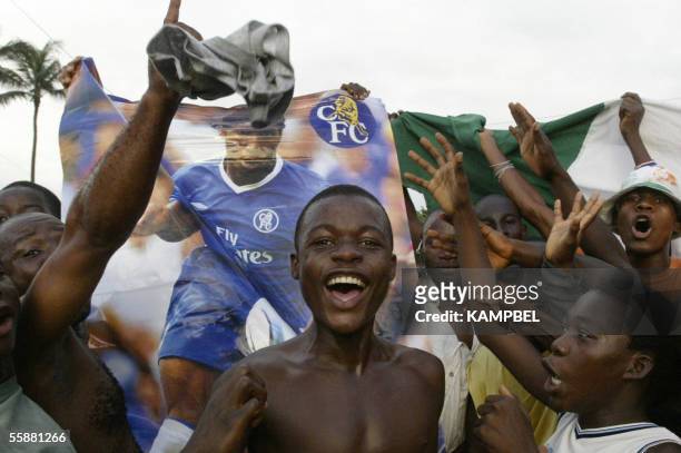 Supporters of the Ivory Coast national football team celebrate their team's victory against Sudan to qualify for the World Championships in 2006....