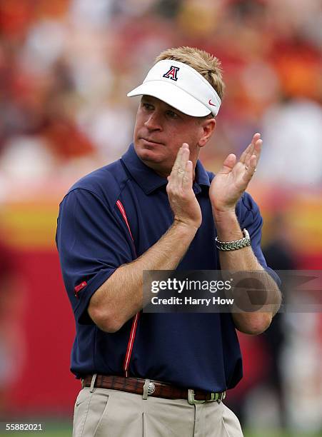 Head Coach Mike Stoops of Arizona cheers on his team at the Los Angeles Colliseum on October 8, 2005 in Los Angeles, California. USC won 42-21.