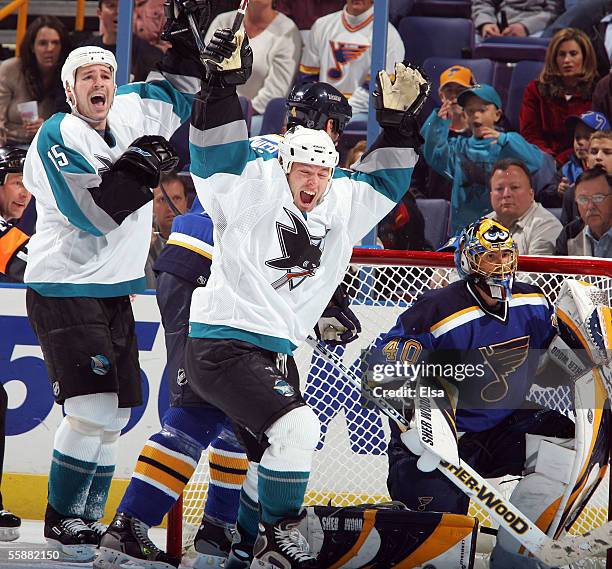 Mark Smith and Wayne Primeau of the San Jose Sharks celebrate the game winning goal that went past Patrick Lalime of the St. Louis Blues on October...