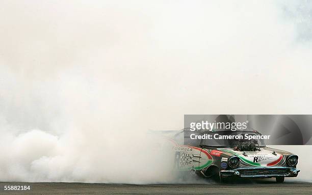 Top Door Slammer Victor Bray performs a burnout during pre-race entertainment prior to the Bathurst 1000 which is round ten of the V8 Supercar...