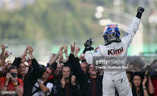 Kimi Raikkonen of Finland and McLaren Mercedes celebrates winning the F1 Grand Prix of Japan on October 9, 2005 in Suzuka, Japan.