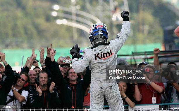 Kimi Raikkonen of Finland and McLaren celebrates after victory in the Japan F1 Grand Prix at the Suzuka Circuit on October 9, 2005 in Suzuka, Japan.
