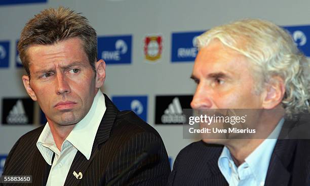 Rudi Voeller and New head coach Michael Skibbe listens to questions from the media during the press conference of Bayer Leverkusen on October 9, 2005...