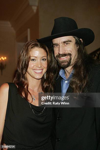 Actress Shannon Elizabeth and professional poker player Chris Ferguson attend the "It's All Goin' To The Dogs!" poker tournament to benefit Animal...