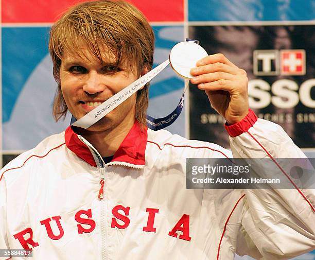 Pavel Kolobkov of Russia poses with his gold medal during the Fencing World Championships 2005 at the Arena Leipzig on October 9, 2005 in Leipzig,...