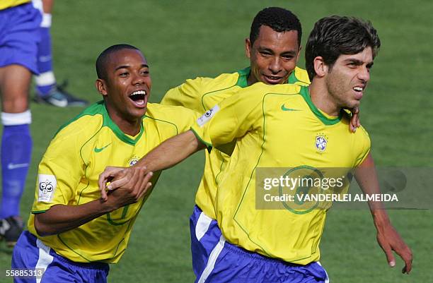 Brazilian Juninho Pernambucano celebrates his goal over Bolivian with teammates Gilberto Silva and Robinho during their FIFA World Cup Germany 2006...