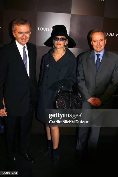 Bernard Arnault, CEO and President of Dior's parent group LVMH,, actress Sharon Stone and French politician Renaud Donnedieu de Vabres attend the...