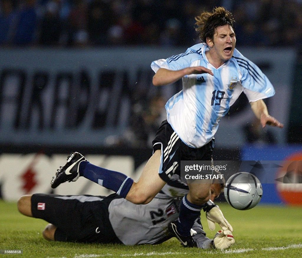 Messi R Argentine Lionel Messi is fouled by Peruvian goalkeeper Leao Butron ...