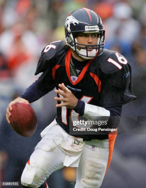 Quarterback Jake Plummer of the Denver Broncos rolls out looking for a receiver against the Washington Redskins as the Broncos defeated the Redskins...