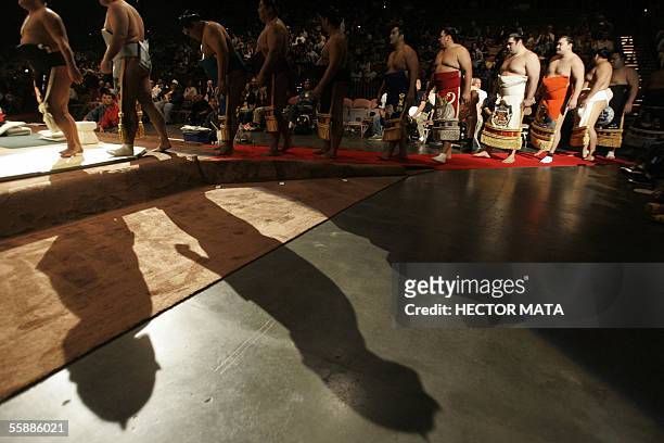 Sumo wrestlers prepare to enter the Dohyo during the third day of the US Grand Sumo Championship at the Mandalay Bay Center in Las Vegas, Nevada 09...
