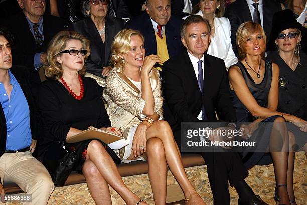 Actresses Catherine Deneuve, Uma Thurman, Bernard Arnault, CEO and President of Dior's parent group LVMH, his wife pianist Helene Mercier Arnault and...
