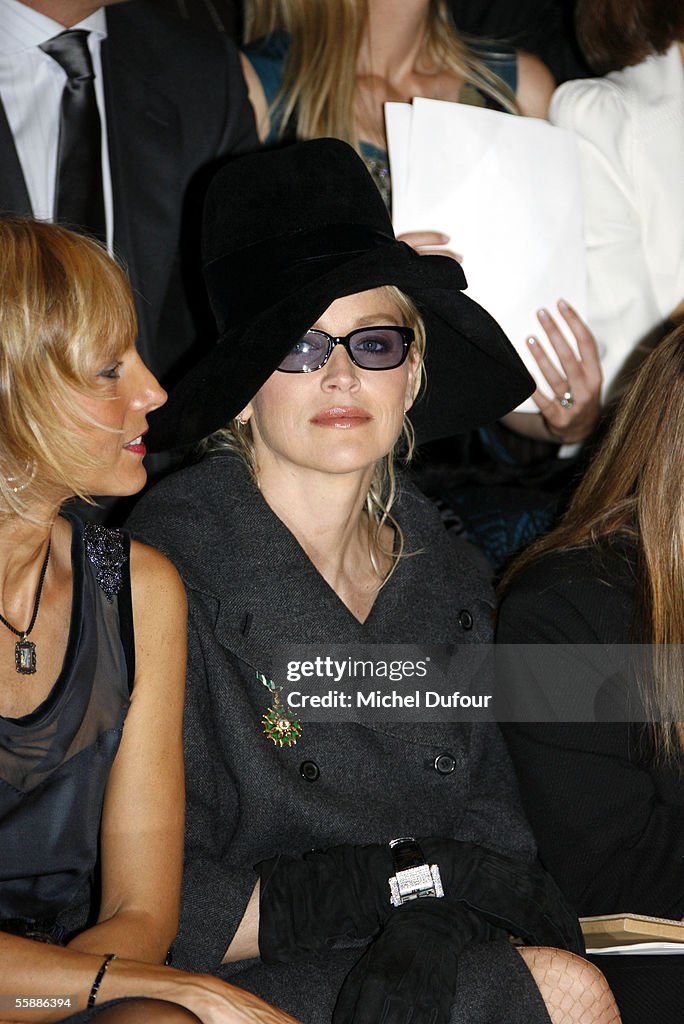 Pianist Helene Mercier Arnault and actress Sharon Stone watch the News  Photo - Getty Images