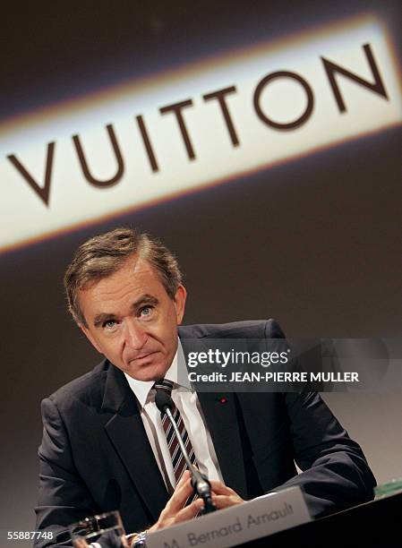Bernard Arnault, chief executive officer of LVMH, which controls French luxury goods maker Louis Vuitton, gives a press conference a day after the...