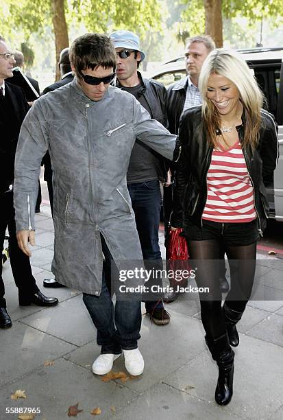 Singer Liam Gallagher arrives with Nicole Appleton at The Q Awards, the annual magazine?s music awards, at Grosvenor House on October 10, 2005 in...