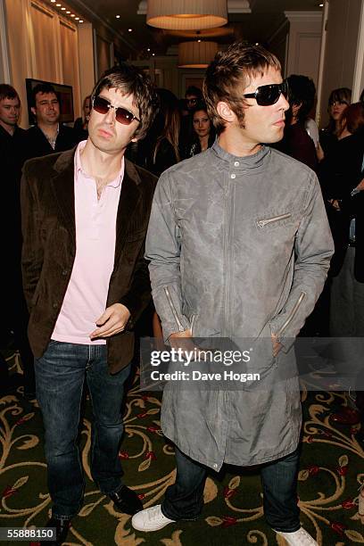 Oasis members Noel and Liam Gallagher arrive at The Q Awards, the annual magazine's music awards, at Grosvenor House on October 10, 2005 in London,...