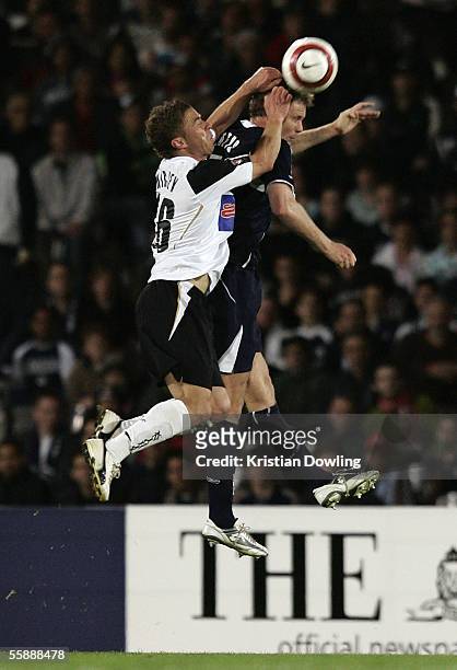 Noah Hickey of the Knights and Geoffrey Claeys of the Victory in action during the round seven A-League match between the Melbourne Victory and the...