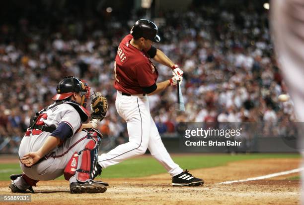 Chris Burke of the Houston Astros hits a solo home run to defeat the Atlanta Braves in Game Four of the 2005 National League Division Series on...